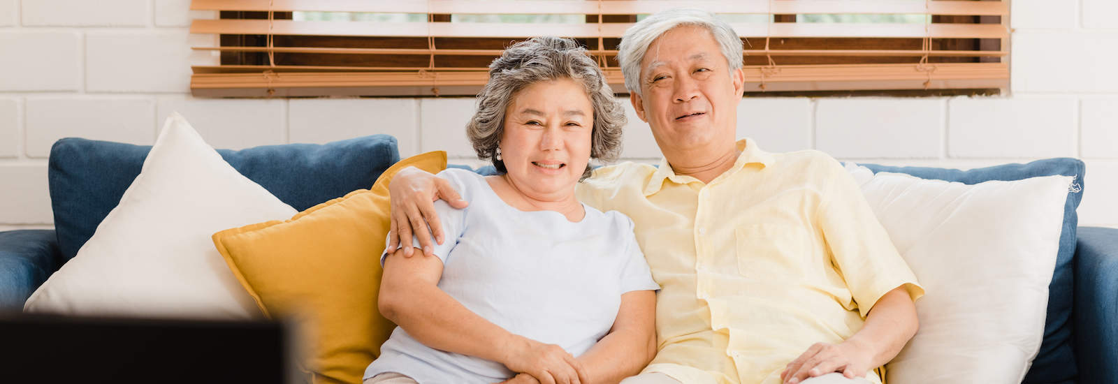 Asian elderly couple sitting